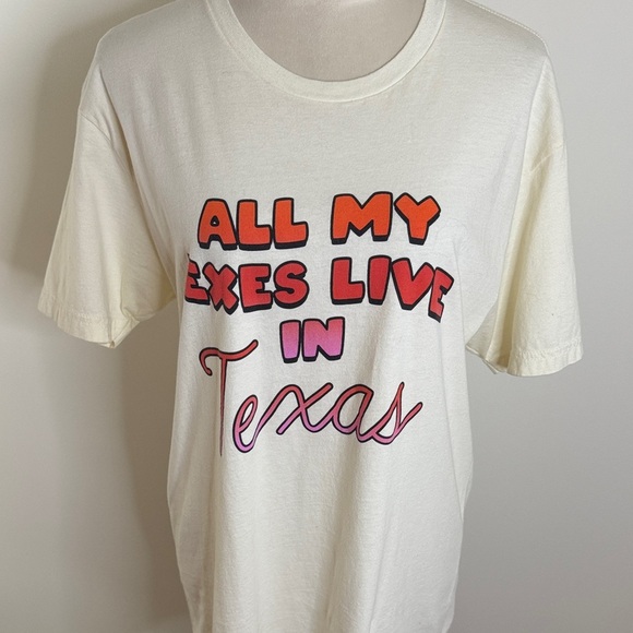 Next Level Apparel Tops - Next Level Apparel Cream Tee with Vibrant Text